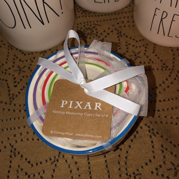 Rae Dunn Toy Story Measuring Cup Set of 4 - Picture 4 of 11